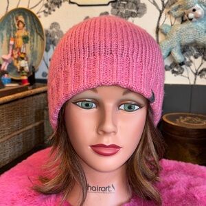 NWOT THE NORTH FACE Pink knit beanie with brown faux fur lining.